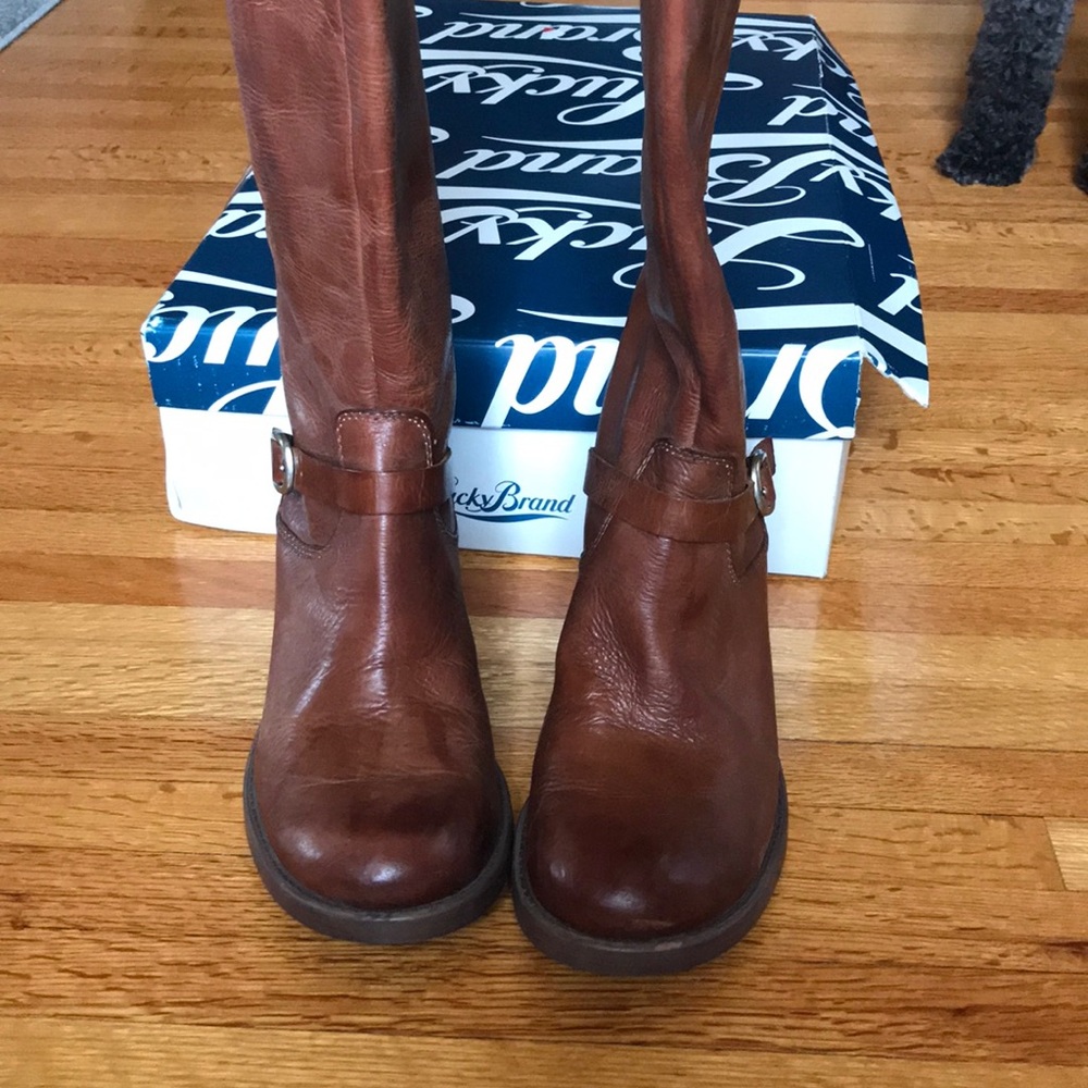 Brown leather boot with buckle
